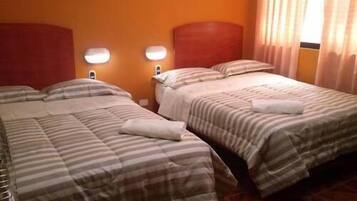 Quarto duplo | Frigobar, camas extras/dobráveis (sobretaxa), Wi-Fi de cortesia