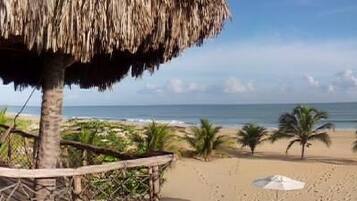 On the beach, sun loungers, beach towels