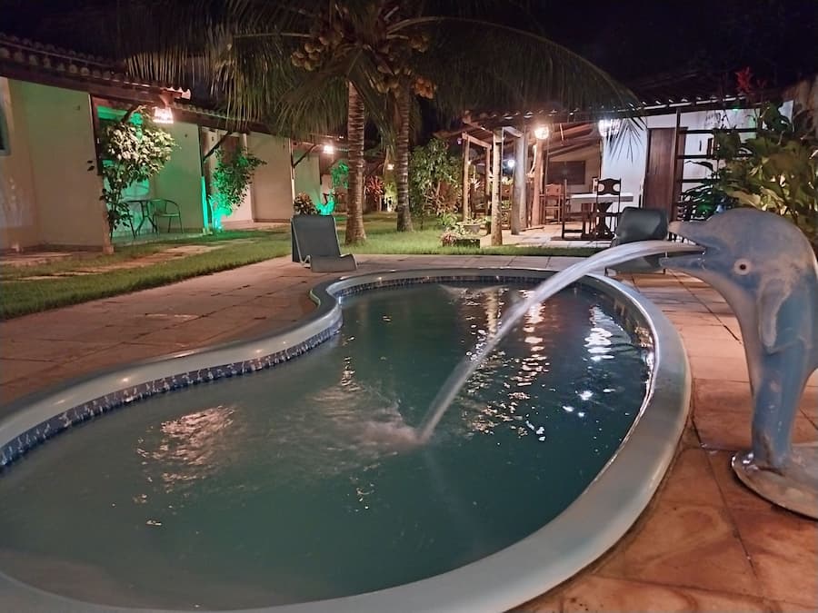 Outdoor pool, open 7:00 AM to 10:00 PM, pool loungers