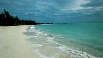 Private beach, white sand, beach umbrellas, beach towels