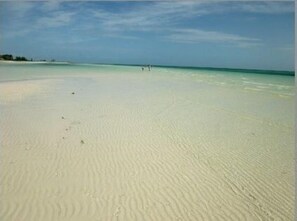 Private beach, white sand, beach umbrellas, beach towels