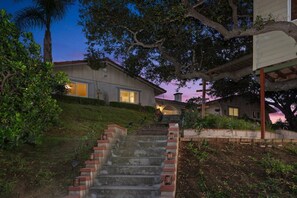 A residential property with a staircase leading to a house, surrounded by trees and vegetation. - Luxe 5B Oasis | Pool, Spa & Views! @Chino Hills (Chino Hills)