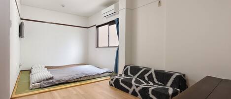 1 chambre, fer et planche à repasser, Wi-Fi, literie fournie