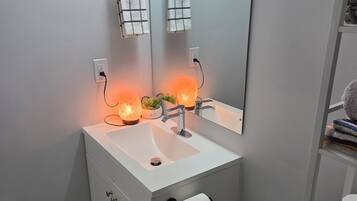 Hair dryer, towels, soap, toilet paper