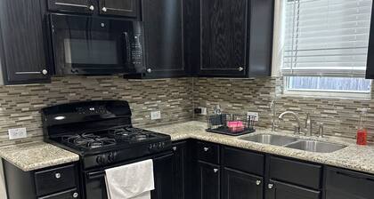 Spacious 4-bedroom house in charming Katy with AC and fitness room