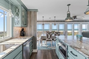 Fridge, microwave, oven, stovetop - Reelaxing: Oceanfront Home in Yaupon Beach, Oak Island, Perfect for 9 guests! (Oak Island)