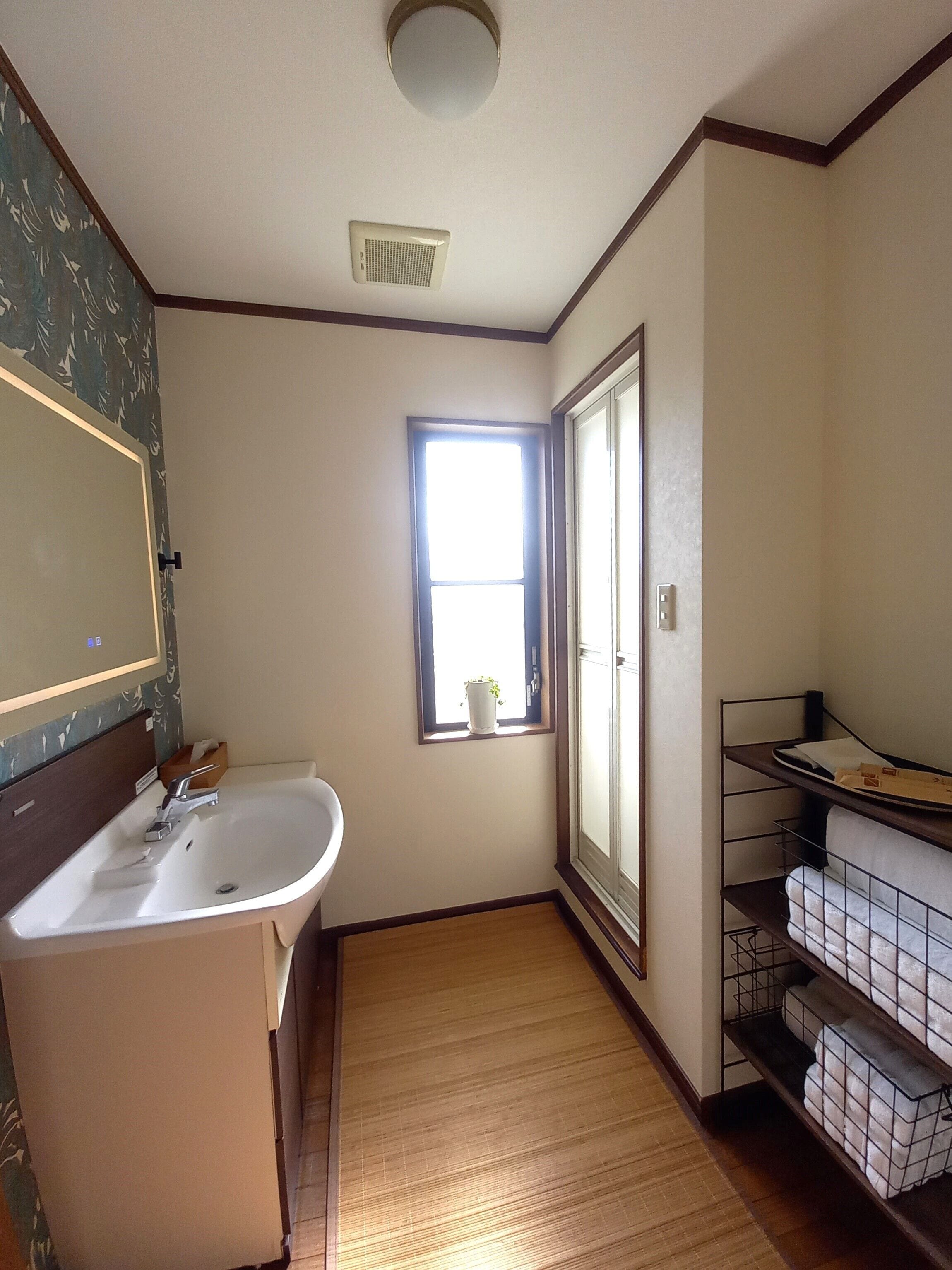 Eco-friendly toiletries, hair dryer, bidet, towels