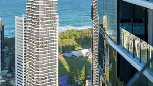 A high-rise building with a view of the ocean and other buildings. - Luxury High-Rise Stay with Panoramic GC Views (Broadbeach)