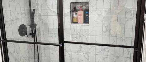 Shower, hair dryer, towels, soap