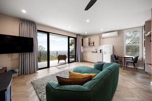TV, fireplace - Sky Suite—A Panoramic Designer Studio in the Hills (Belair)