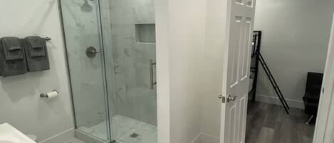 Hair dryer, towels, soap, toilet paper