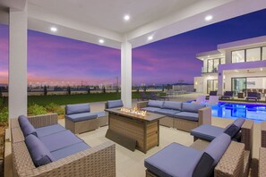 Deluxe Quadruple Room, Balcony, Mountain View | Teres/patio