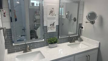 Hair dryer, towels, soap, toilet paper