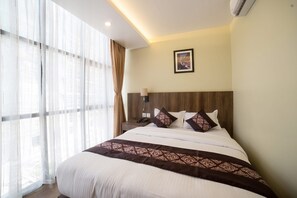 Habitación Deluxe doble | Escritorio y espacio para trabajar con un portátil