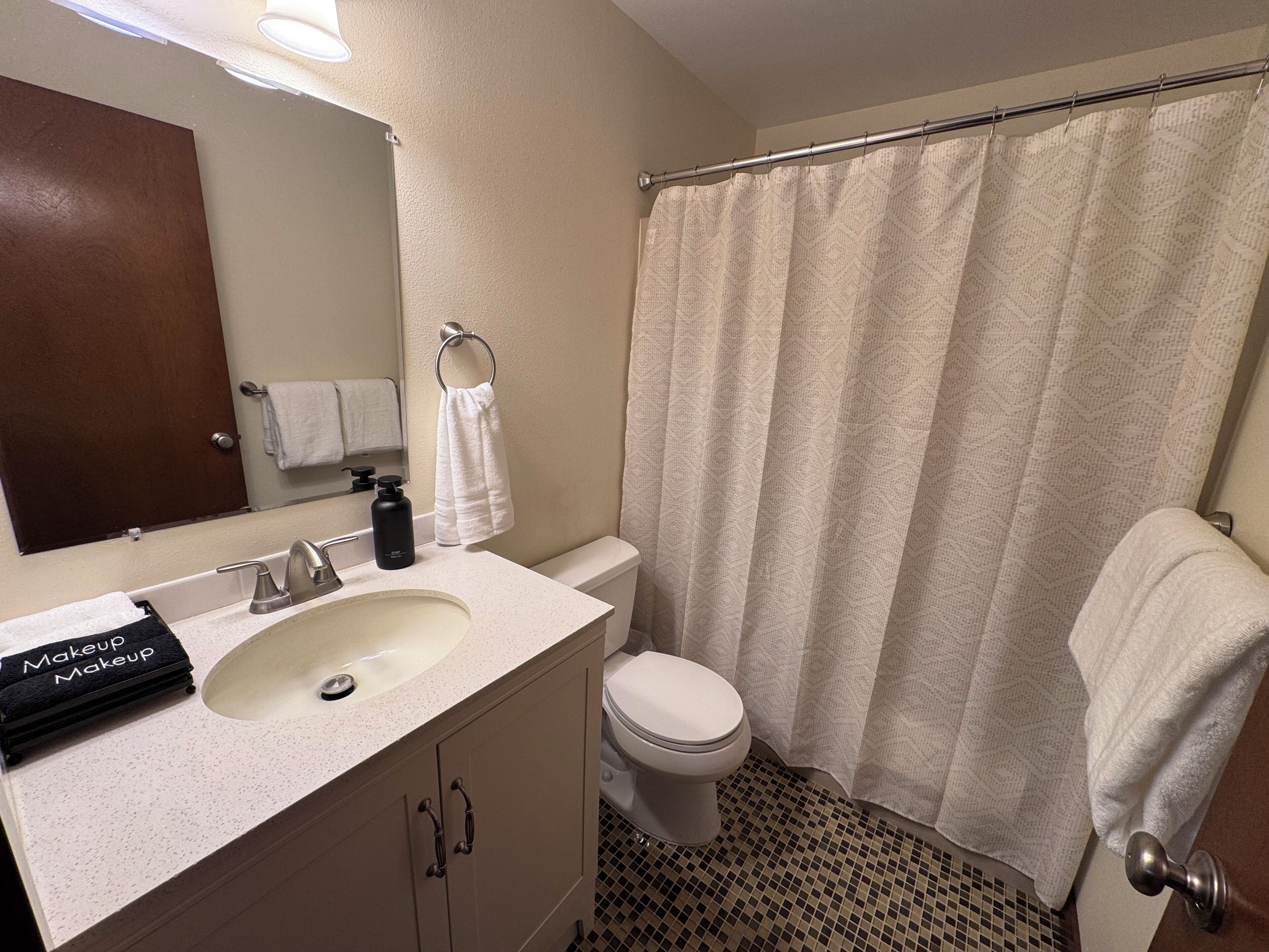 Hair dryer, towels, soap, toilet paper