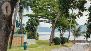 On the beach, white sand, free beach cabanas, sun-loungers