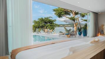 Exclusive Villa, 1 King Bed, Sea View, Beachfront | Pool | Outdoor pool, free cabanas, sun loungers