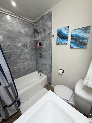 Shower, hair dryer, towels, soap