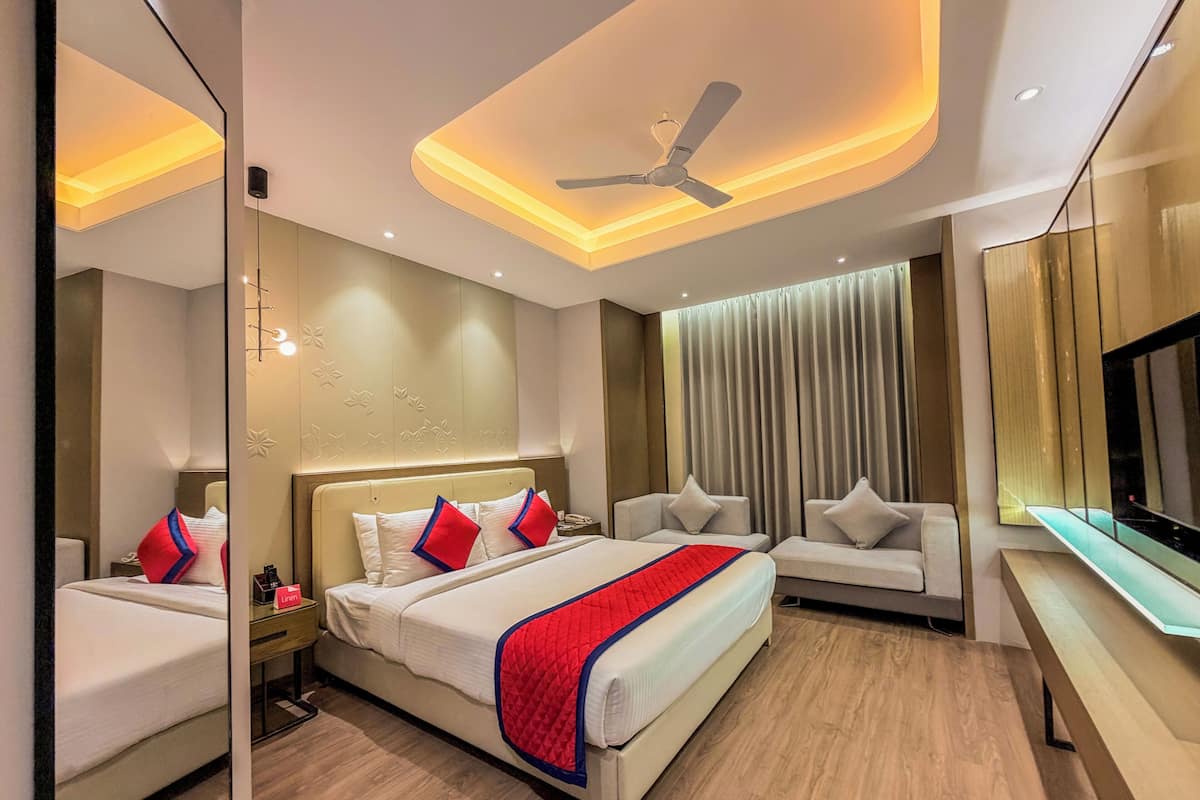 Habitación Deluxe | Ropa de cama de alta calidad y minibar
