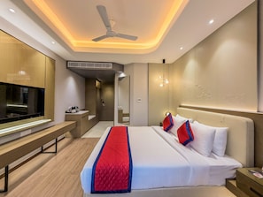 Habitación Deluxe | Ropa de cama de alta calidad y minibar 