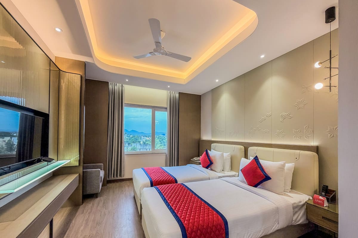 Habitación Deluxe con 2 camas individuales | Ropa de cama de alta calidad y minibar