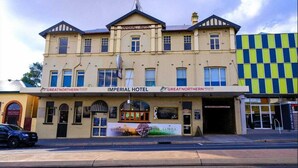 A two-story building with a sign reading 'Imperial Hotel' and 'Great Northern Brewing' on the ground floor. - The Imperial Hotel (Cowra)