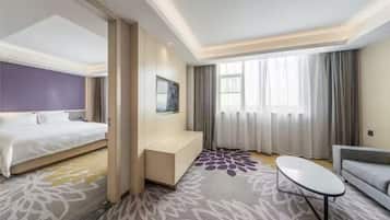 Luxury Suite, City View | Desk, laptop workspace, free WiFi, bed sheets