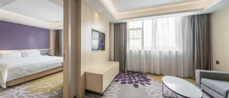 Luxury Suite, City View | Desk, laptop workspace, free WiFi, bed sheets