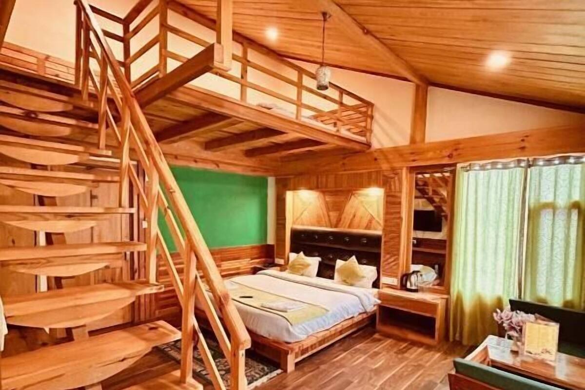 Perhehuone, parveke, vuoristonäköala