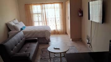 Appartement, 1 chambre | Salle de séjour