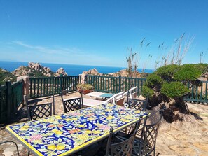 Outdoor dining - A beautiful elevated architect designed villa with breathtaking sea views. (Costa Paradiso)