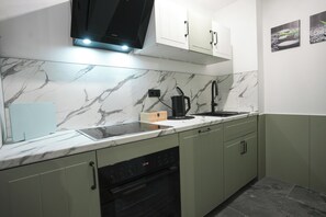 Réfrigérateur, four, plaque de cuisson, lave-vaisselle