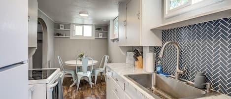 Fridge, microwave, stovetop, coffee/tea maker