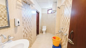 Shower, rainfall showerhead, slippers, towels