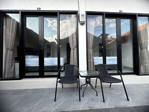 Quarto luxo, sacada | Terraço/pátio