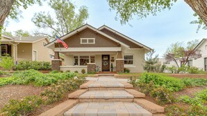 A residential house with a front porch, steps leading to the entrance, and a flag. - 3 Blocks to Plaza! Historic Prescott Gem w/ Grill (Prescott)