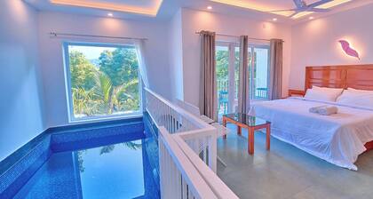 Ice Cliff Munnar by VOYE HOMES