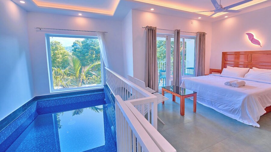 Ice Cliff Munnar by VOYE HOMES