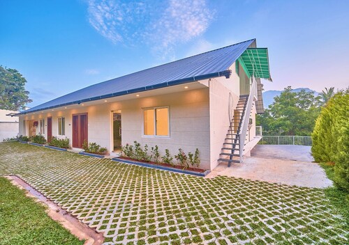 Ice Cliff Munnar by VOYE HOMES