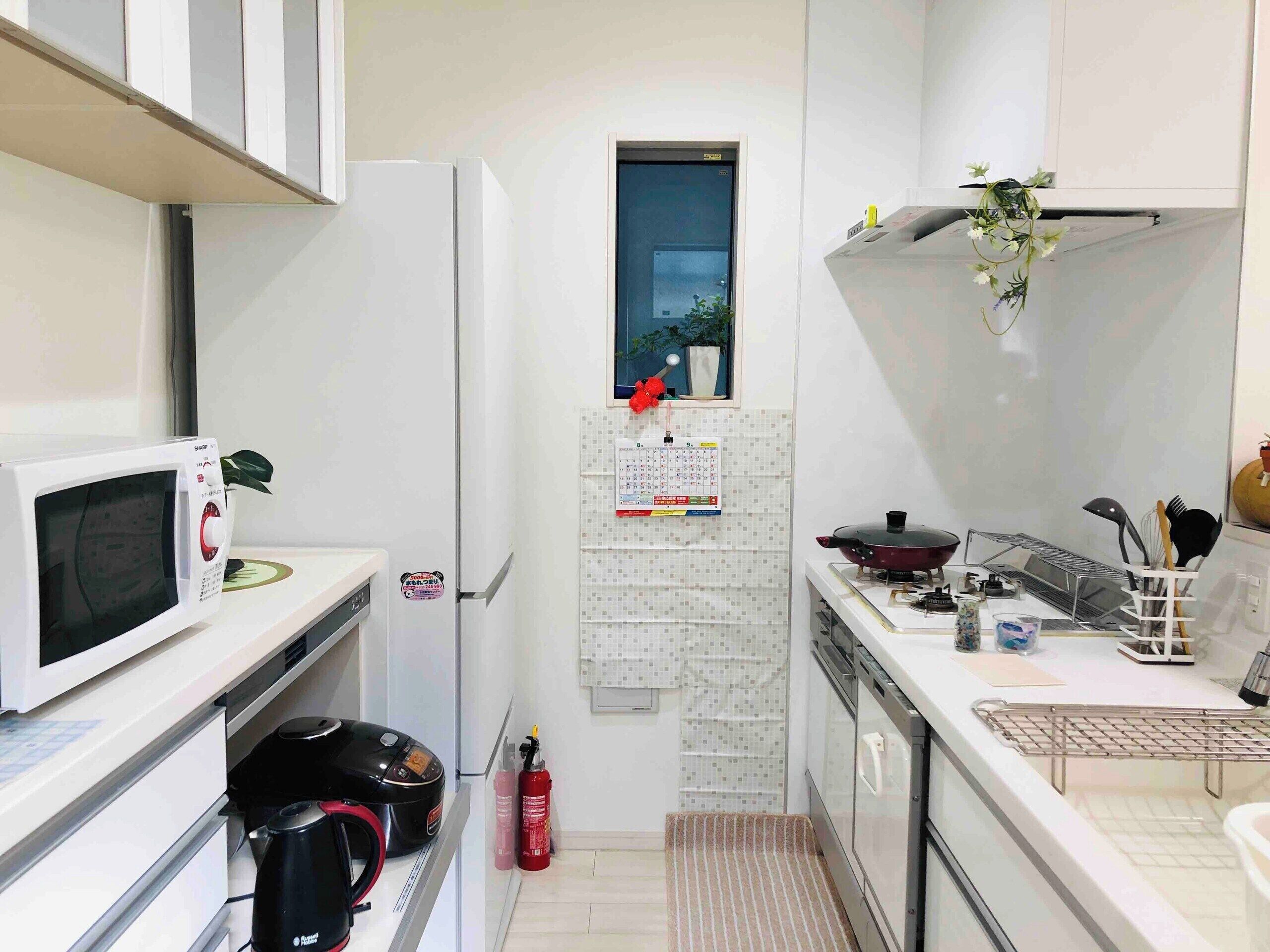 House, Balcony, City View | Private kitchen | Coffee/tea maker, electric kettle