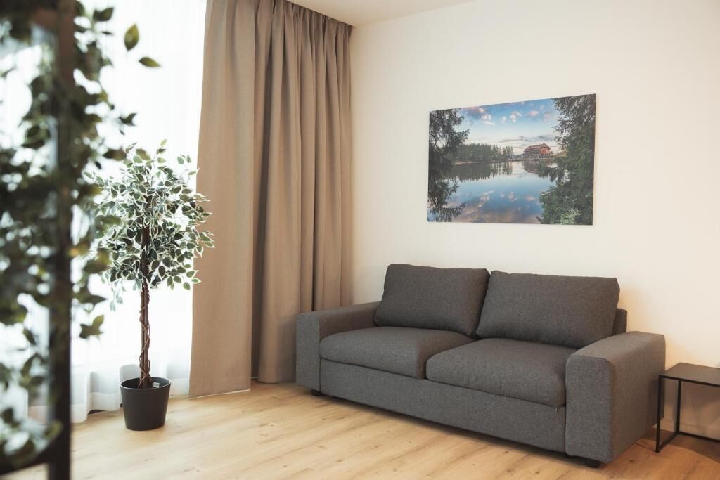 Appartement Familial, vue jardin | Coin séjour