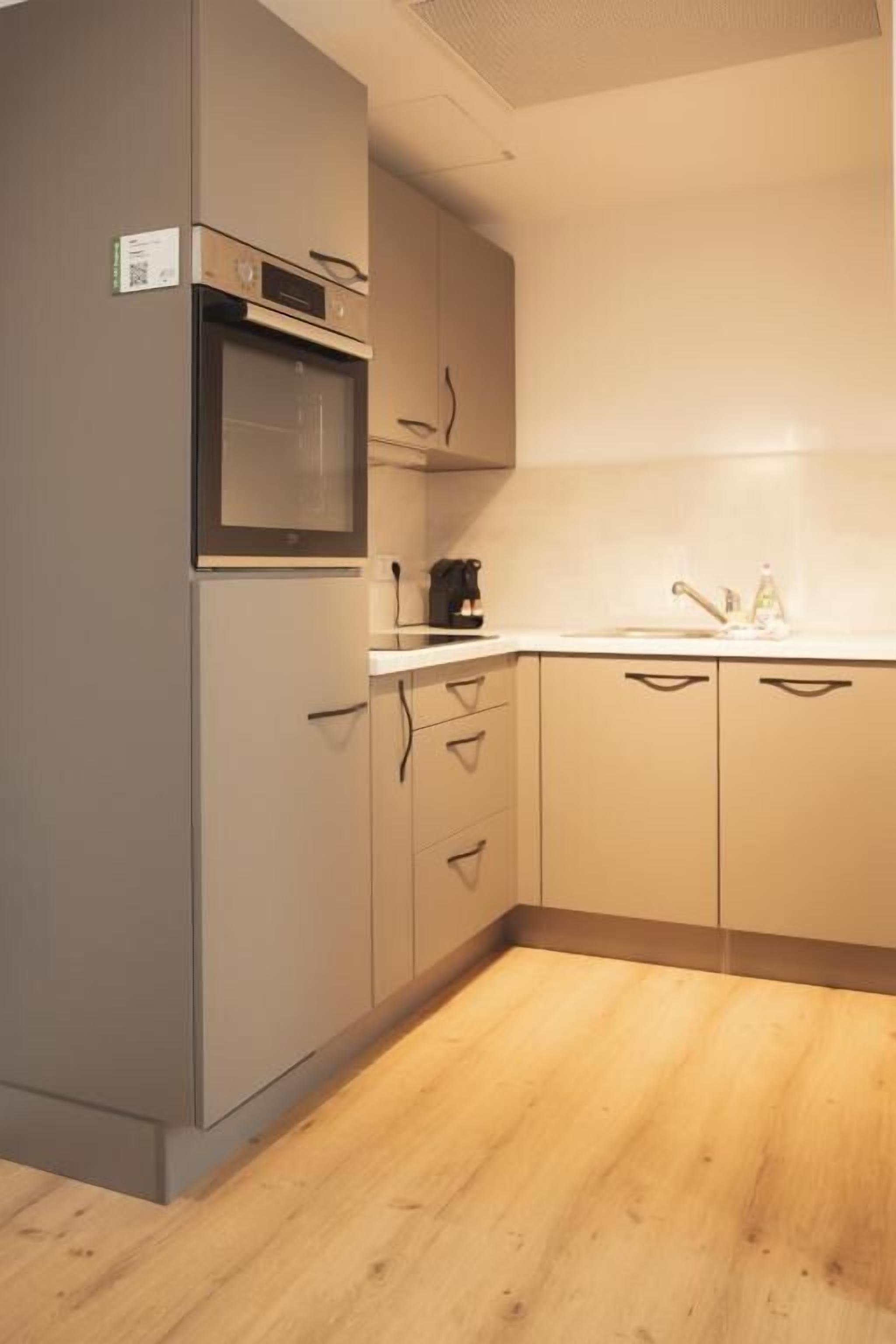 Apartment, Garden View | Private kitchen | Fridge, oven, stovetop, dishwasher