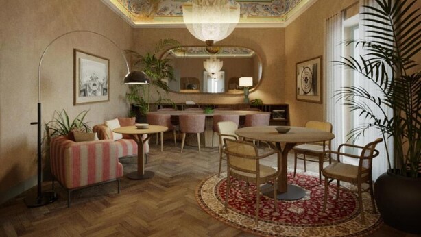 A room with a herringbone floor, a round table with chairs, a sofa, and a chandelier.