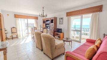Apartamento, 2 quartos | Área de estar