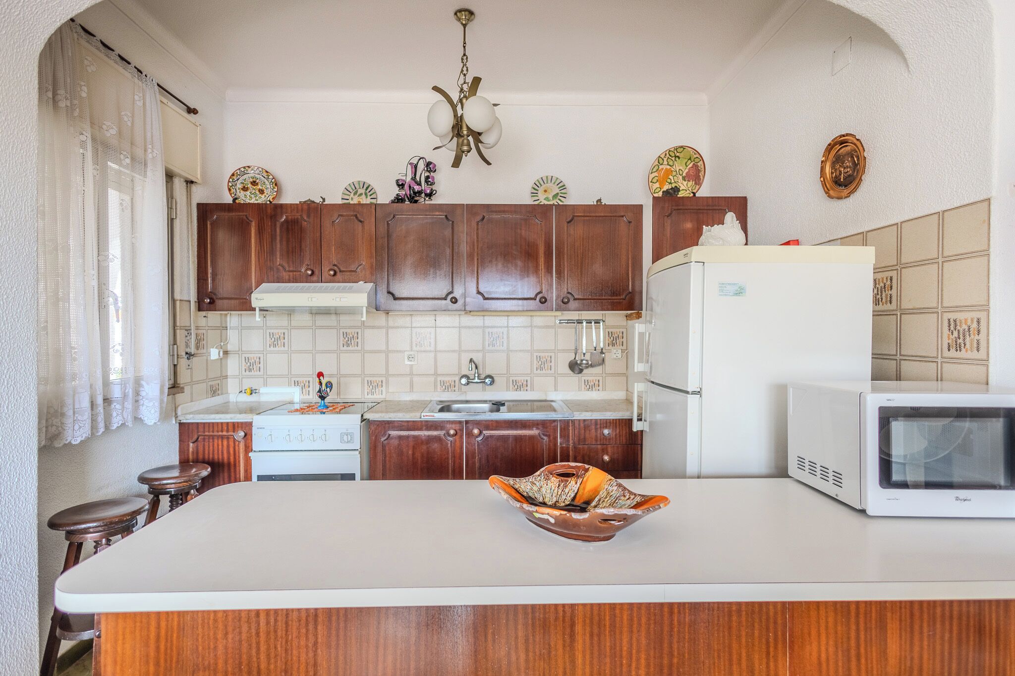 Apartamento, 2 quartos | Cozinha privada | Geladeira grande, micro-ondas, fogão, cooktop