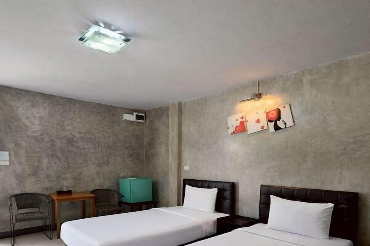 Quarto casal ou duplo superior, vista para o jardim