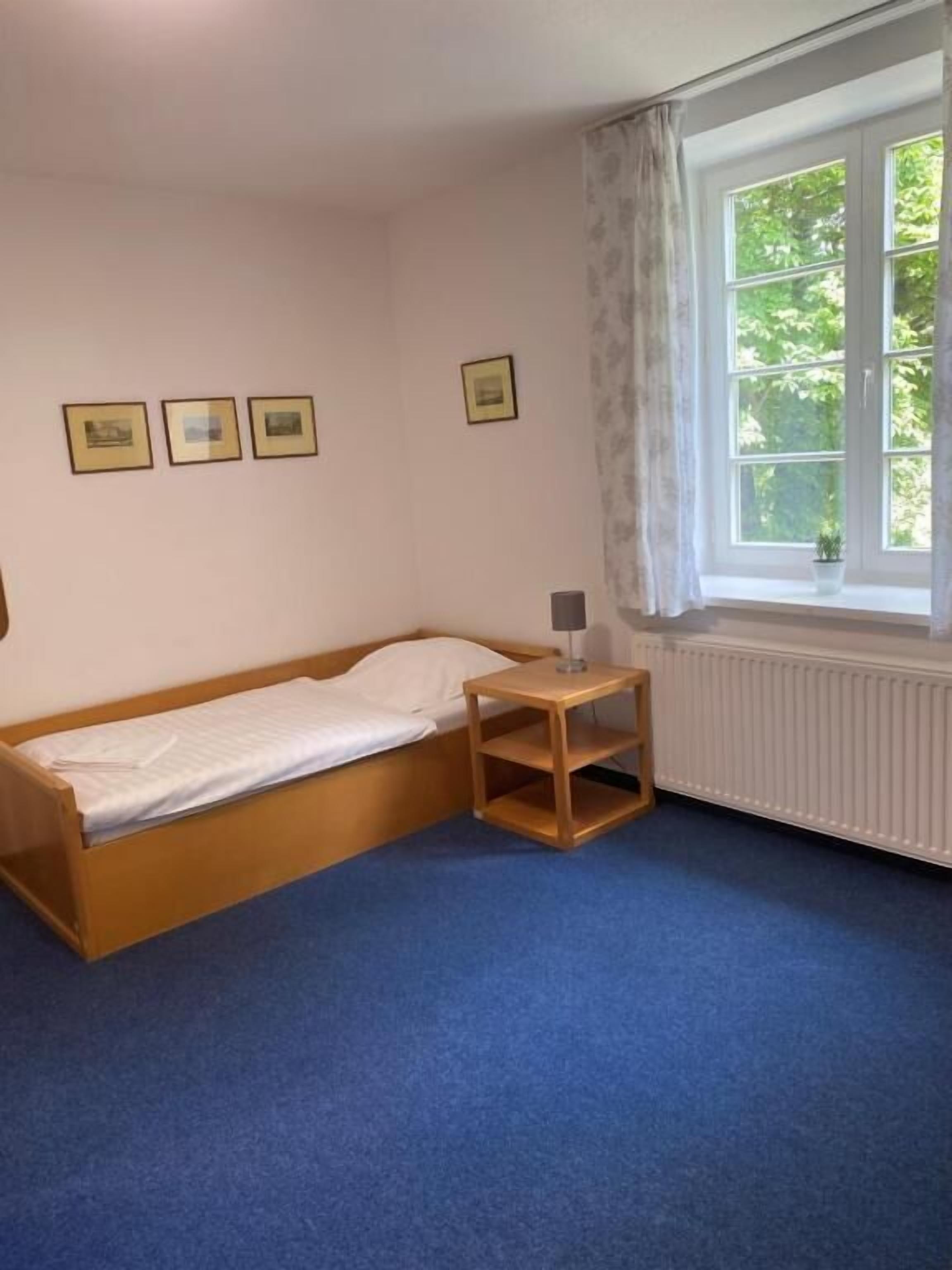 Yhden hengen economy-huone, näköala puutarhaan