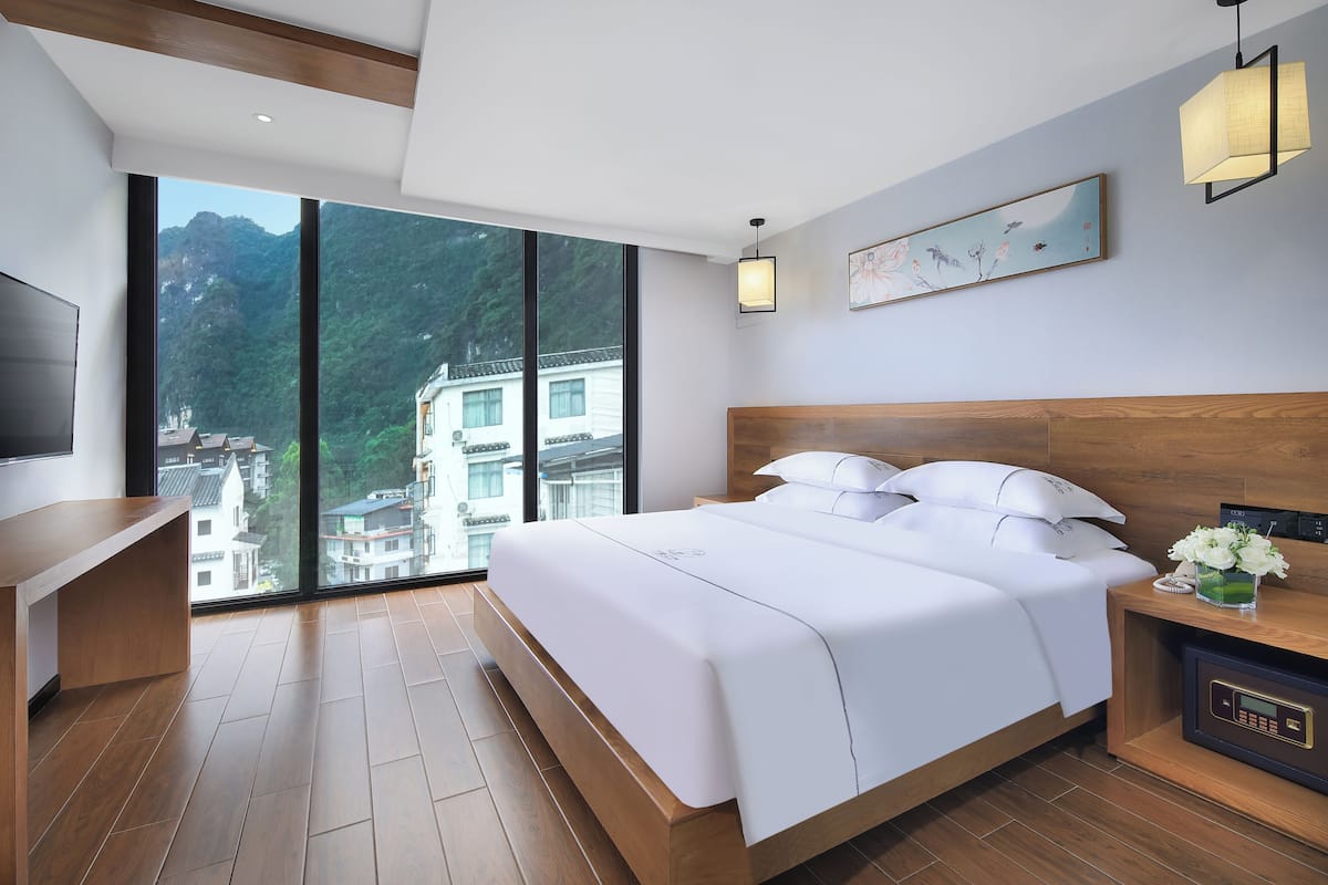 Superior Suite, 2 Bedrooms, Refrigerator | Desk, laptop workspace, blackout drapes, free WiFi