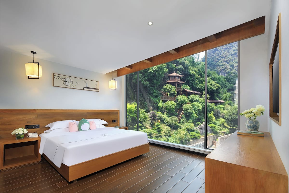 Family Suite, Multiple Beds, Refrigerator, Garden View | Desk, laptop workspace, blackout drapes, free WiFi