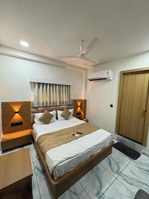 Quarto casal luxo, vista para a cidade